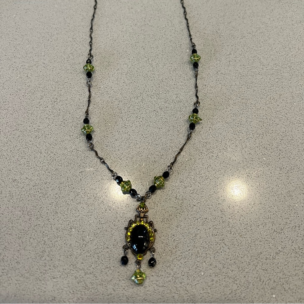 Black onyx and peridot necklace (see my closet for matching earrings)